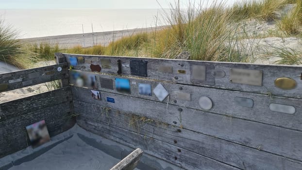 View over the sea from the dune over North Sea and canal in Ouddorp, Zeeland province, The Netherlands. Outdoor scene of coast in Europe nature.