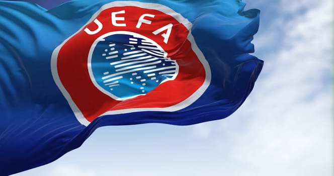 Nyon, CH, September 2022: The flag with the UEFA logo waving in the wind. UEFA is the association that manages professional football in Europe