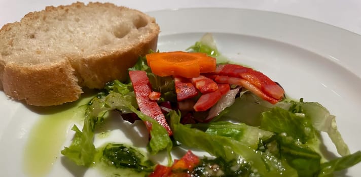 Fresh prepared salad on a plate, bowl.