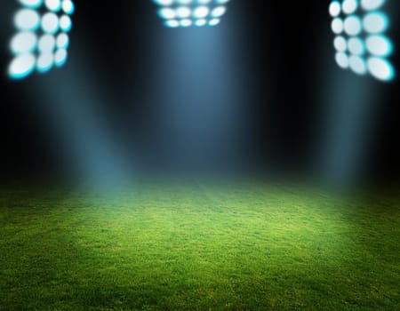 green soccer field and bright lights