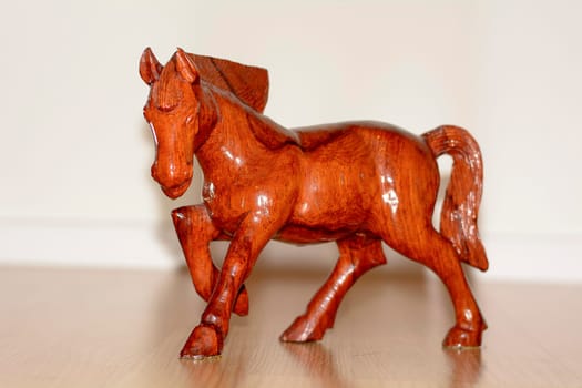 This picture is the wooden horse. It is a carving horse.