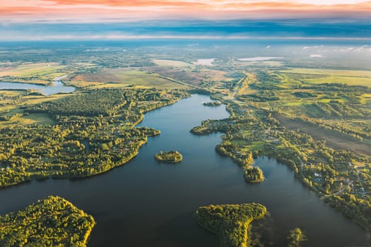 Lyepyel, Lepel Lake, Beloozerny District, Vitebsk Region. Aerial View Of Lyepyel Cityscape Skyline In Autumn Morning. Morning Fog Above Lepel Lake. Top View Of European Nature From High Attitude In Autumn. Bird's Eye View.