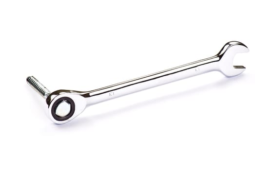 Stainless Steel Wrench and bolt over white background