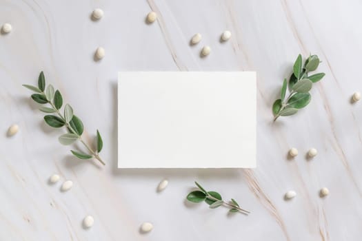 Horizontal card on a marble table decorated with eucalyptus branches and white stones top view, Wedding Mockup. Romantic flat lay with blank menu card. Minimal composition. Close to nature