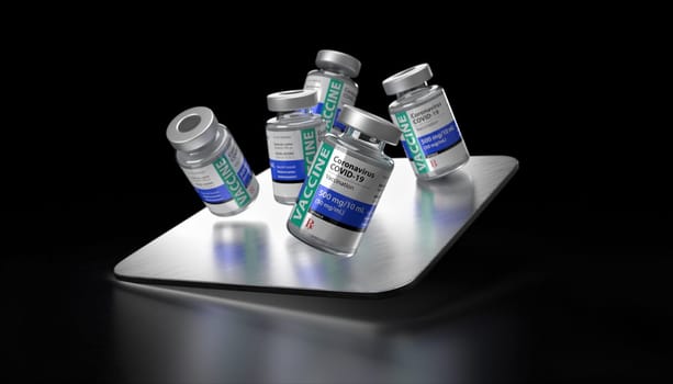 Coronavirus COVID-19 Vaccine Vials Balancing on Metal Tray on Black Background.