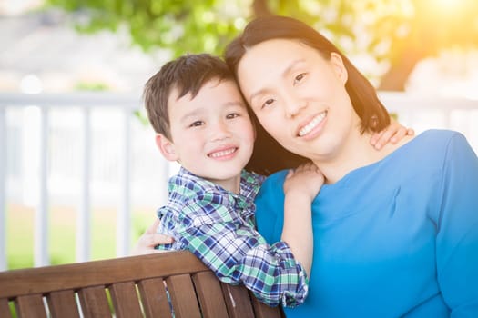 Outdoor Portrait of Chinese Mother with Her Mixed Race Chinese and Caucasian Young Boy