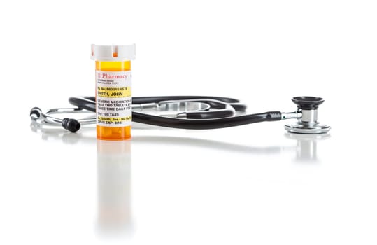 One Non-Proprietary Medicine Prescription Bottle with Stethoscope Isolated on a White Background.