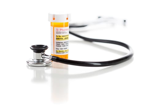 One Non-Proprietary Medicine Prescription Bottle with Stethoscope Isolated on a White Background.