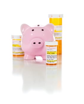 Piggy Bank and Non-Proprietary Medicine Prescription Bottles Isolated on a White Background.