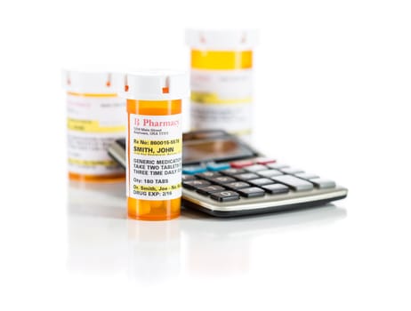 Calculator and Non-Proprietary Medicine Prescription Bottles Isolated on a White Background.