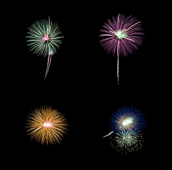 Collection of colorful festive four fireworks exploding over night sky, isolated on black background