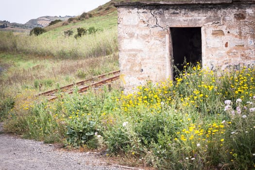 Littlle abandoned house stone in countryside in Sardinia