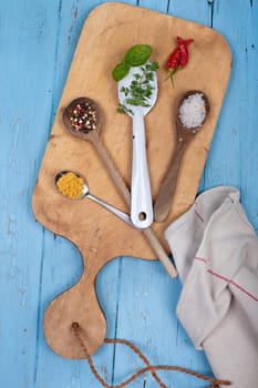 Spoon with spices and herbs
