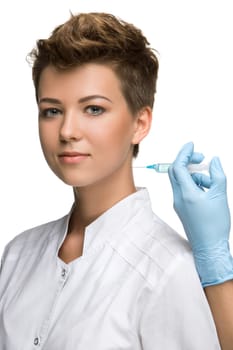 pretty young woman  and vaccine syringe  isolated on white background
