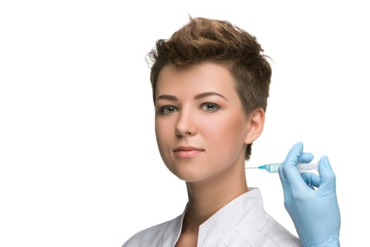 pretty young woman  and vaccine syringe  isolated on white background