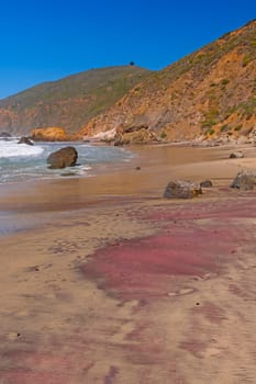 Red Sands on a Remote Coast on Pfeiffer Beach in California
