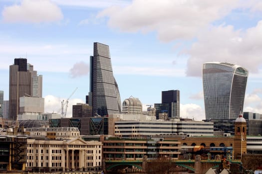 London,UK – April 01,2015: The skyline of the City of London office complex with the 20 Fenchurch Street skyscraper,the Leadenhall building and other high-rise buildings on April 1,2015 in London.