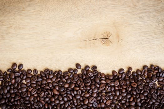 coffee beans blank on wood background