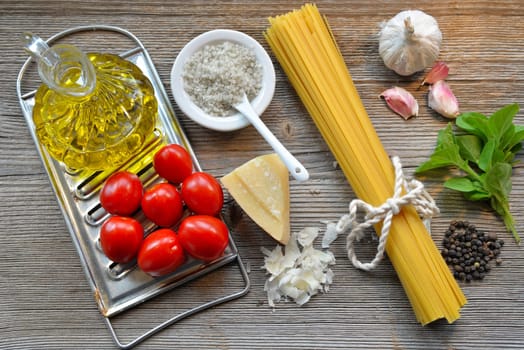 Pasta Tomatoes Parmesan on wood background
