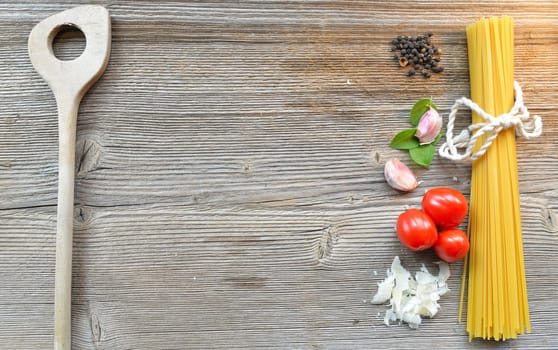 Pasta wood background table empty cooking spoon