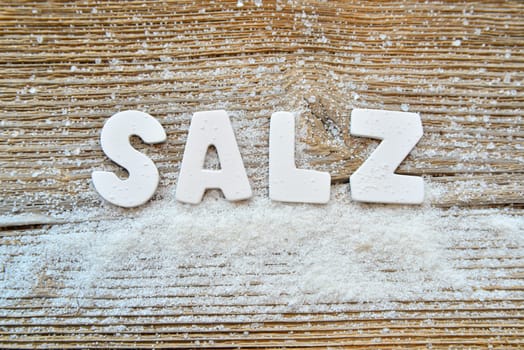 Salt on wooden board