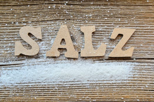 Salt on wooden board