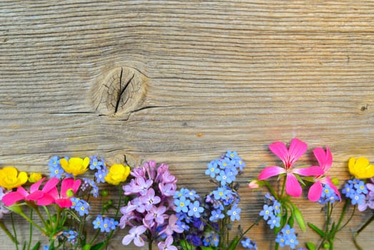 flowers on a wooden board