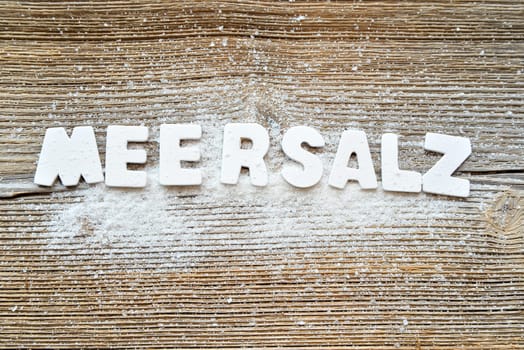 Salt on wooden board