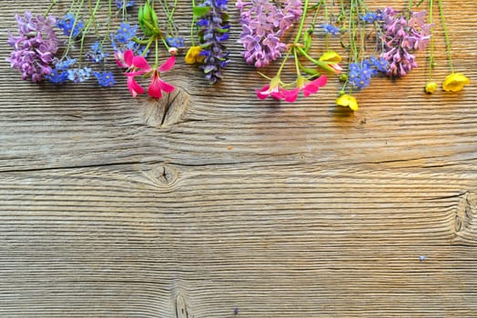 flowers on a wooden board
