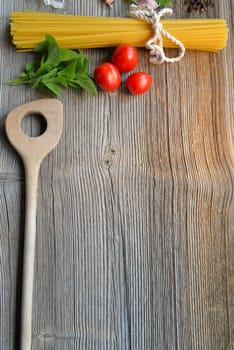 Pasta wood background table empty cooking spoon
