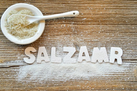 Salt on wooden board