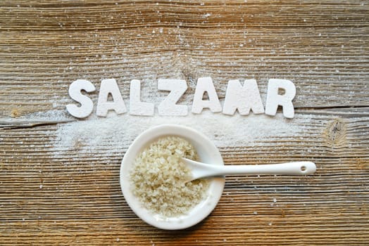Salt on wooden board