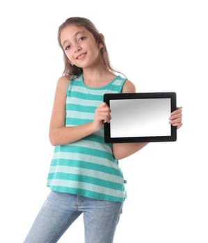 Beautiful pre-teen girl with a tablet computer. Isolated. Clipping path for the screen