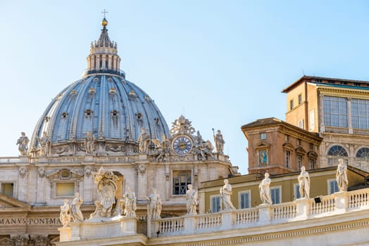 Particulars of San Pietro Church and the column in the square, Rome Italy, the Dome and the Clock