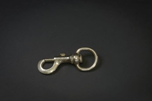 A Carabiner on a black background