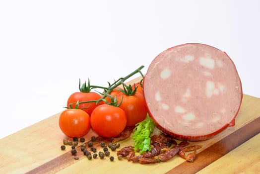 Italian Mortadella Bologna with tomatoes and vegetables