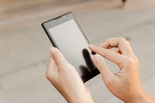 closeup hand using smartphone mobile