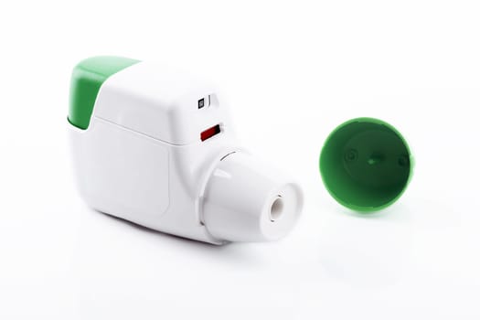Metered Dose Inhaler isolated over white background