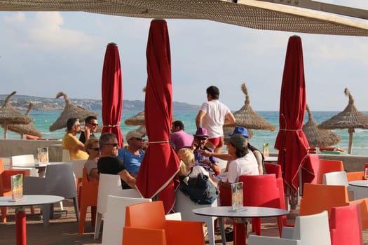 Tourists in the street cafe of Palma de Mallorca island sight landscape water sea hiking church port Spain holiday island