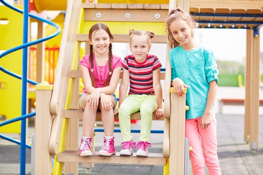 Active girls having fun on playground