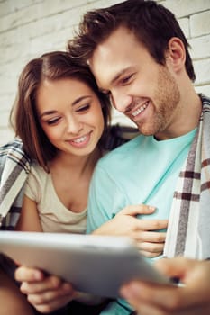 Amorous couple networking at home