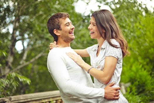 Happy woman and her husband in natural environment