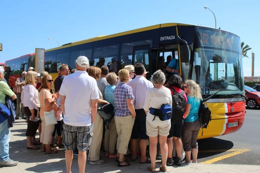 Tourists are waiting for the bus in Mallorca. Palma de Mallorca Island Sight Landscape Water Sea Hiking Hiking Church Port Spain Holiday Island