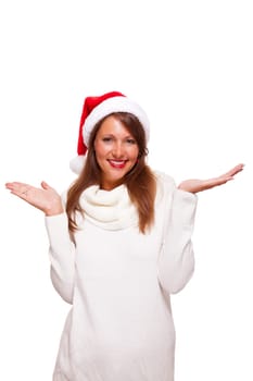Attractive woman wears a festive red Christmas hat and cuddles up in a turtleneck sweater with a charming friendly smile,isolated on white