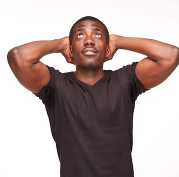 portrait of handsome young black african dreaming man,  isolated on white background. Positive human emotions.