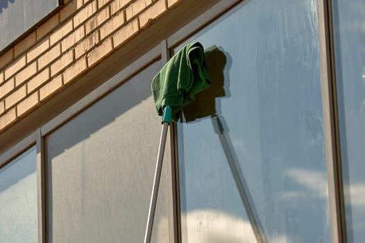window washing, washing a street shop window. High quality photo