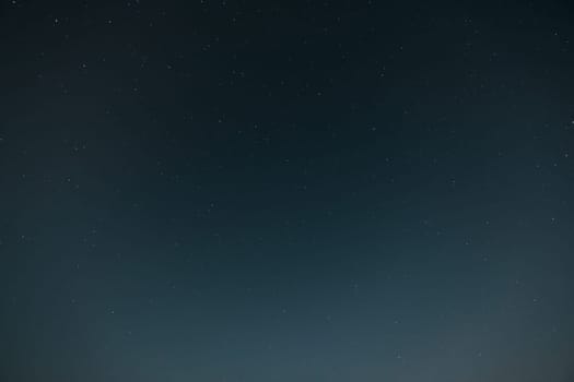Real Night Sky Stars. Natural Starry Sky Blue Color Background.