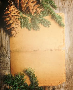 Christmas holiday paper background with fir tree and christmas decoration top view design. Xmas frame for new year wish list letter to santa. Merry Christmas empty card.