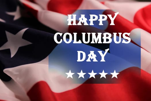 The inscription Happy Columbus Day on the background of the USA flag. Columbus Day 2022 concept.