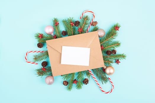 Christmas holiday background, frame with fir branches, baubles, candy cane and cones, winter season greeting card